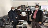 اهدای لوح تقدیر دکتر کرمی معاون بهداشتی دانشگاه و رئیس مرکز بهداشت استان همدان ، از مدیر و پرسنل بهداشت و درمان شهرستان نهاوند